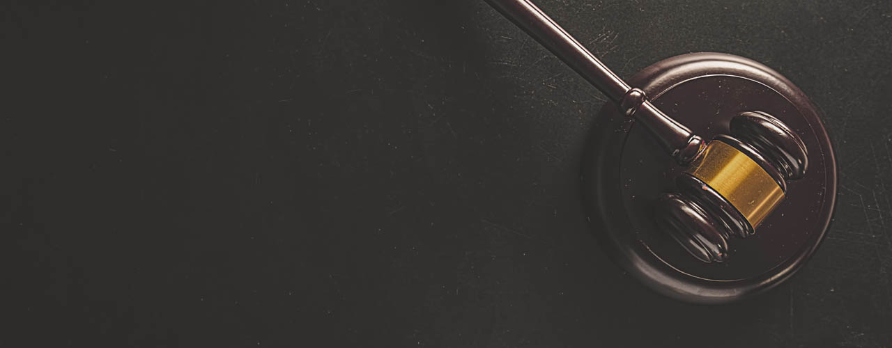 Judge gavel with Justice lawyers having team meeting at law firm