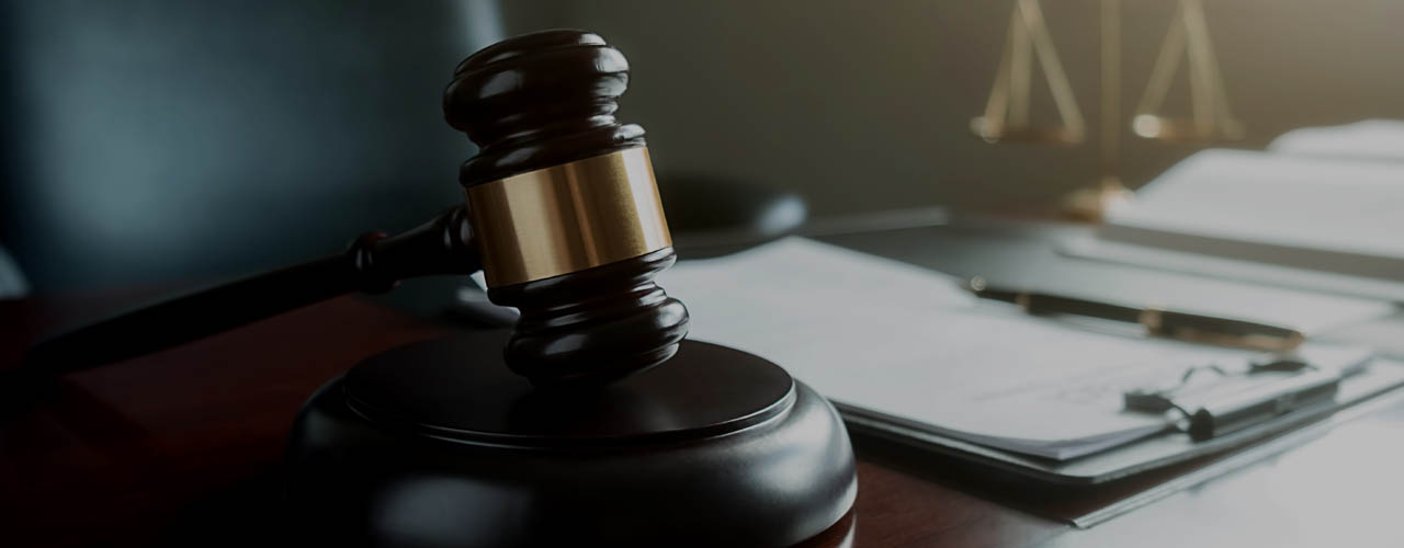 udge gavel with Justice lawyers having team meeting at law firm