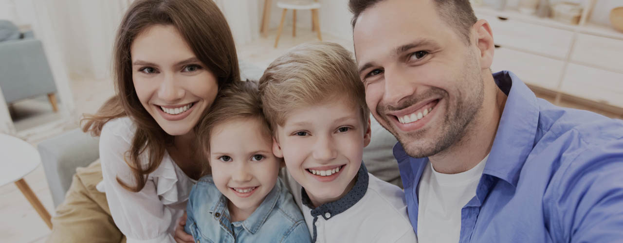 Cute Family Selfie. Happy Parents And Children Smiling Posing To